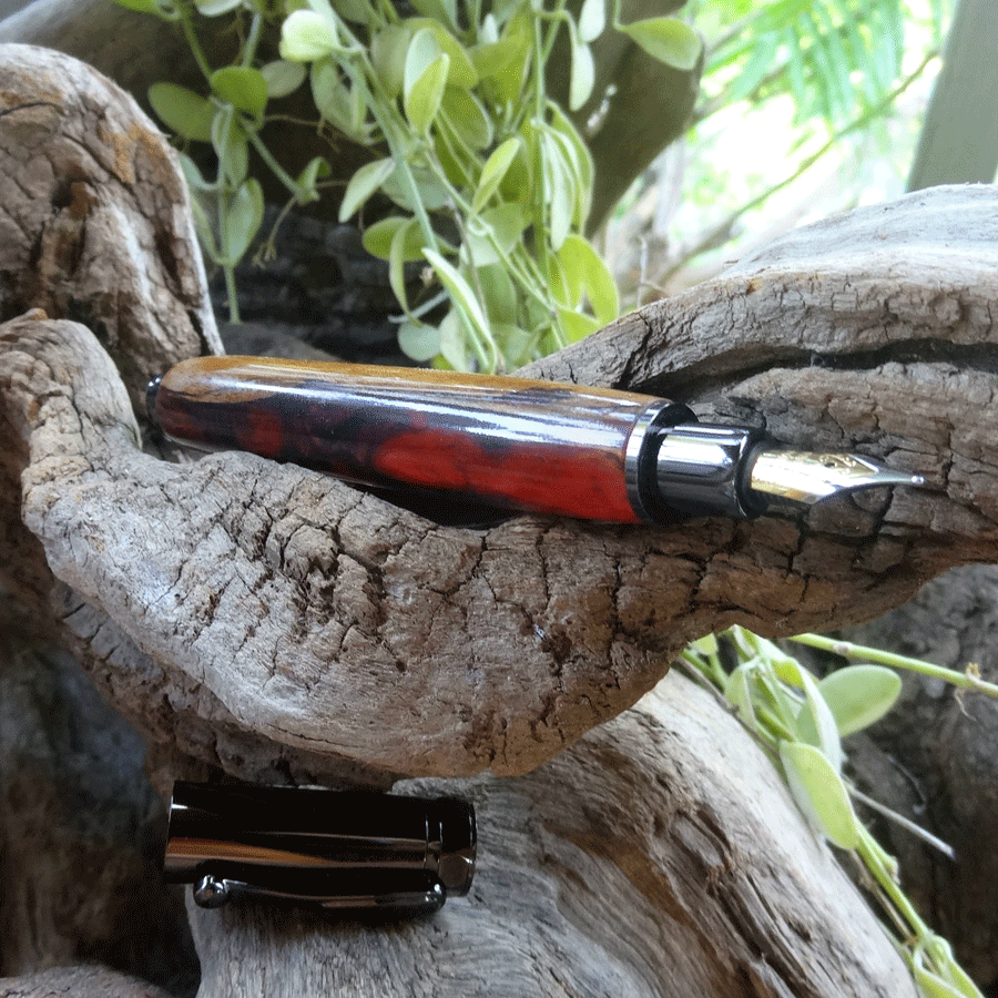 Driftwood and red pink resin fountain pen