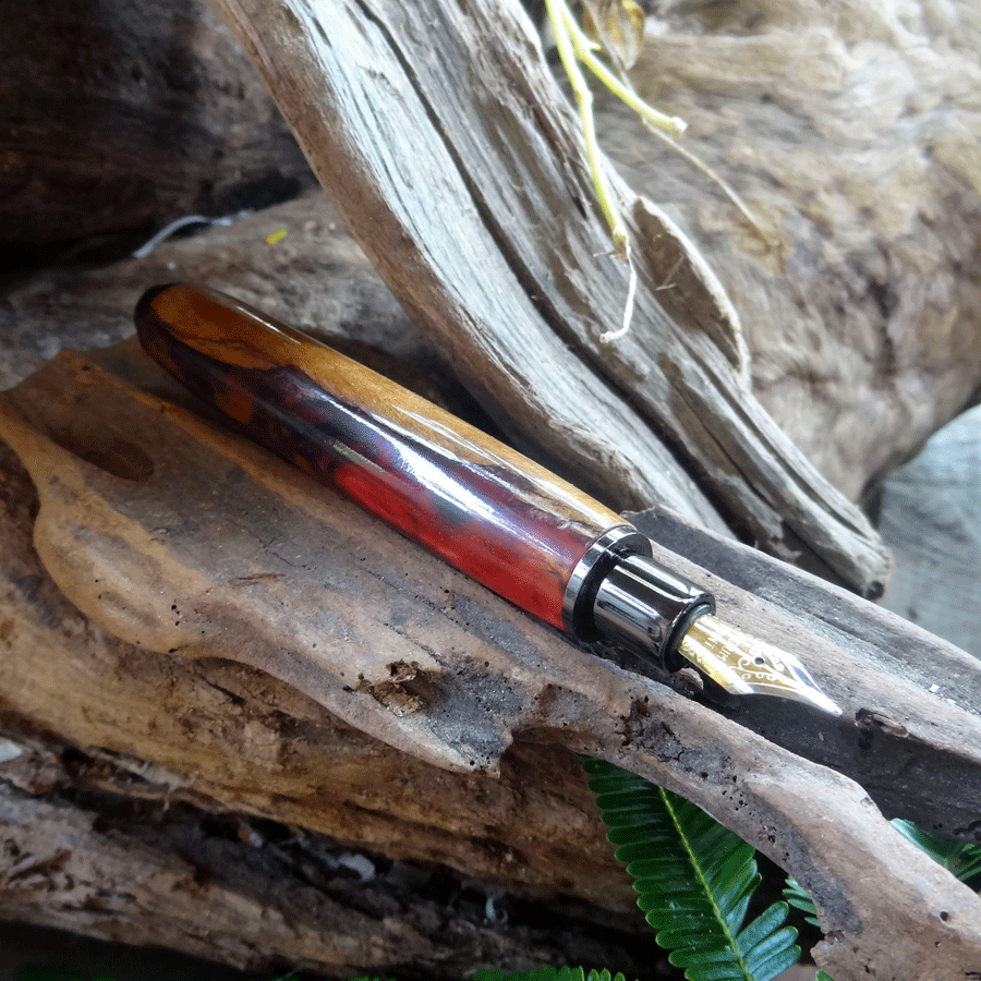 Driftwood and red pink resin fountain pen