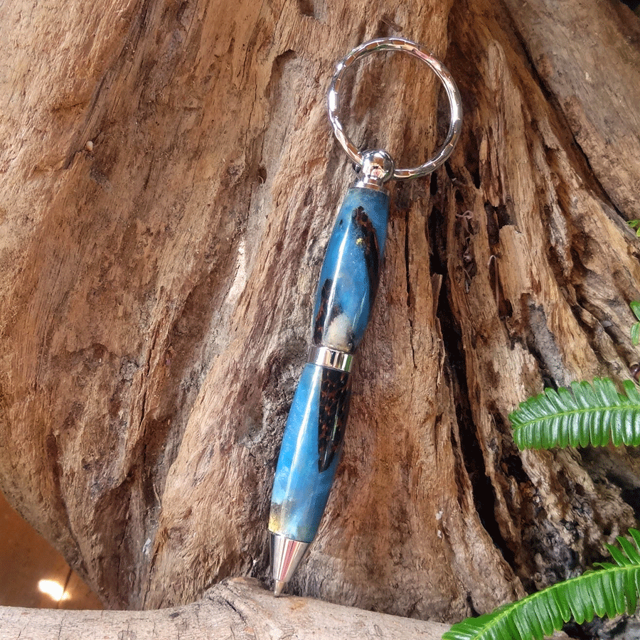 Driftwood and blue resin key chain twist pen