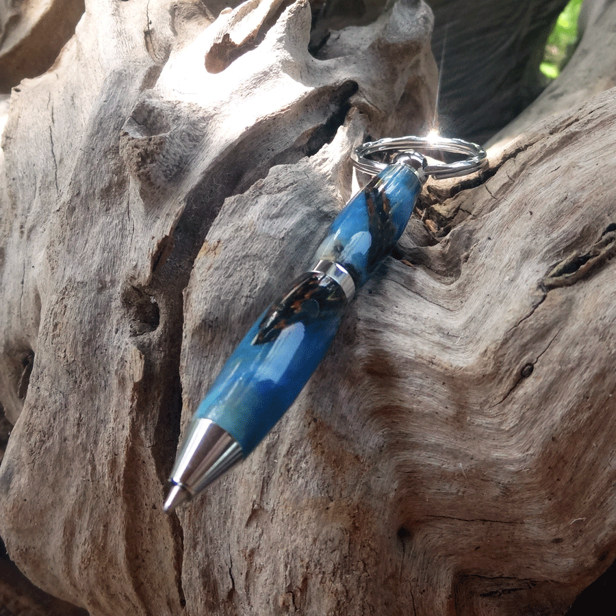 Driftwood and blue resin key chain twist pen