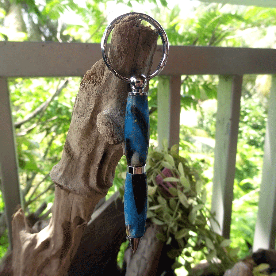 Driftwood and blue resin key chain twist pen