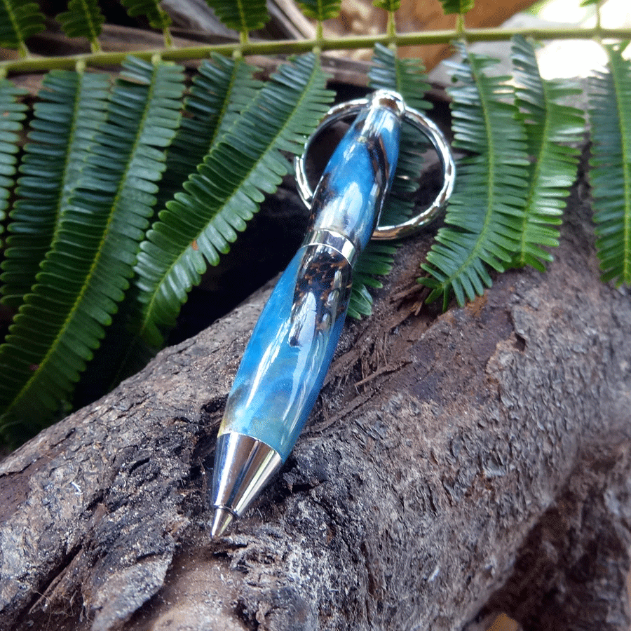 Driftwood and blue resin key chain twist pen