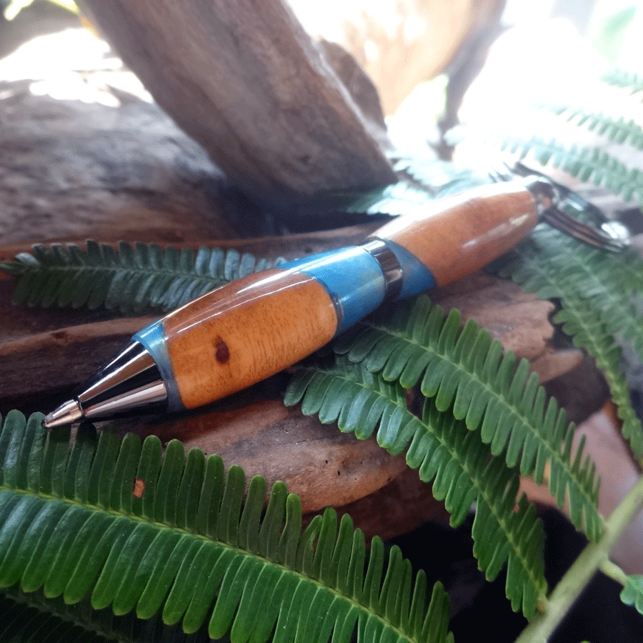 Driftwood and blue resin key chain twist pen