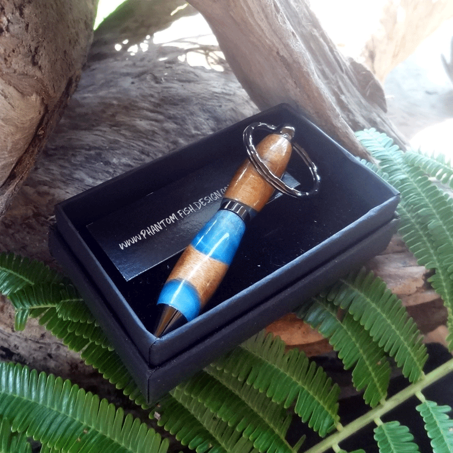 Driftwood and blue resin key chain twist pen