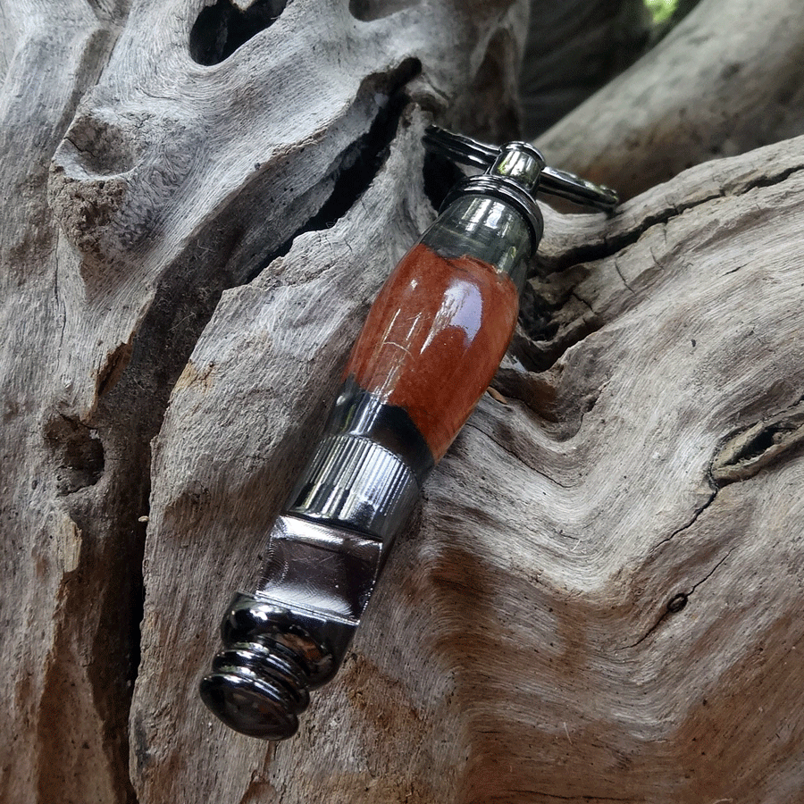 Driftwood and black resin key chain bottle opener