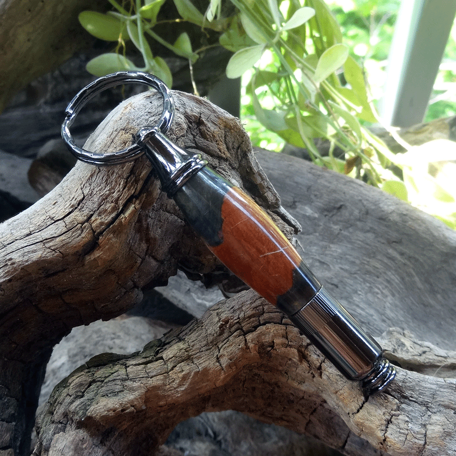 Driftwood and black resin key chain bottle opener