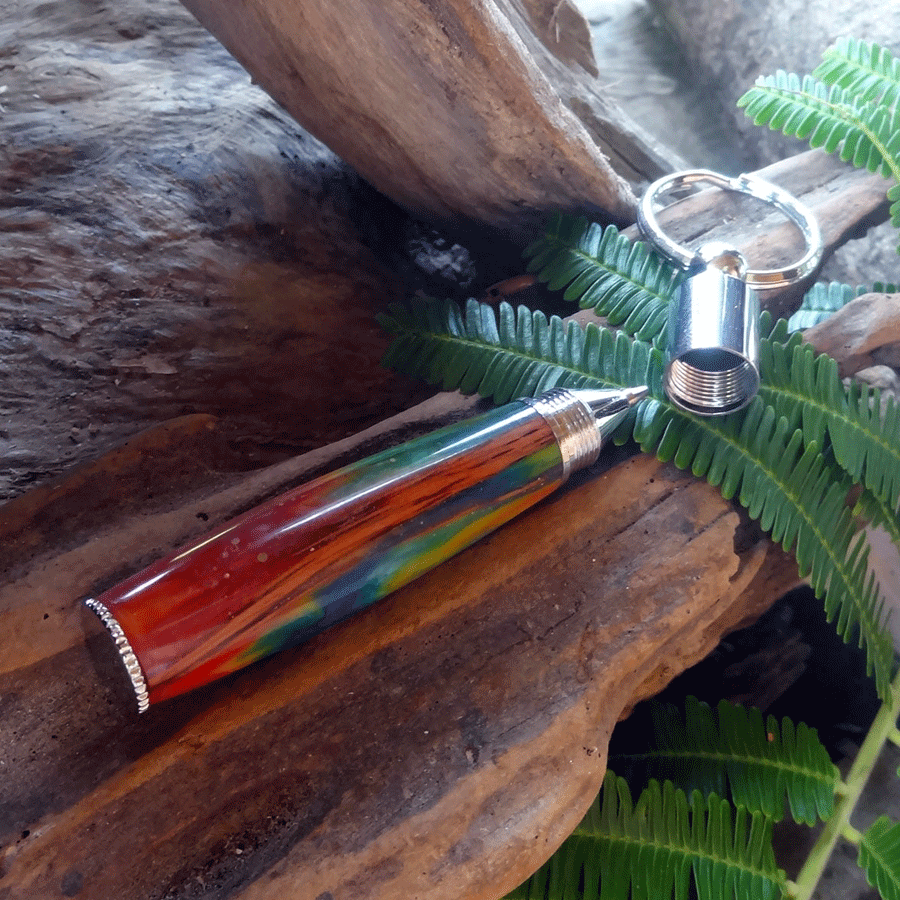 Driftwood and rainbow coloured resin key chain pen