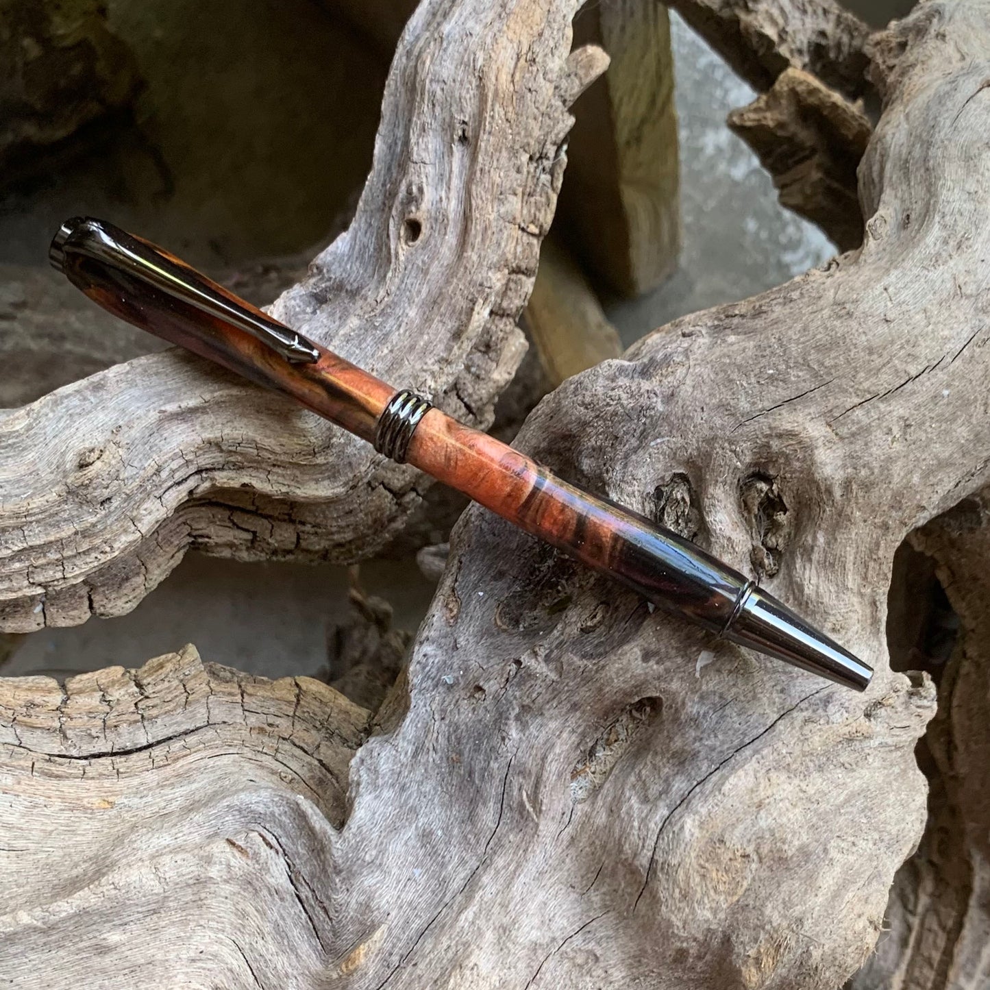 Driftwood and black and red resin pen