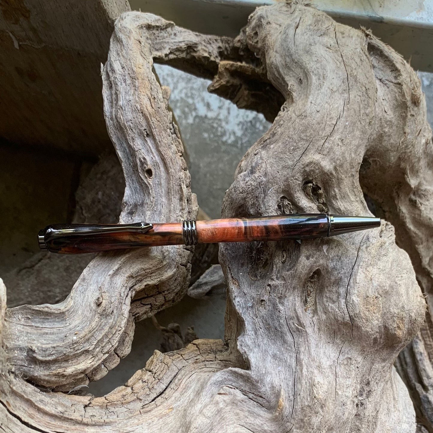 Driftwood and black and red resin pen