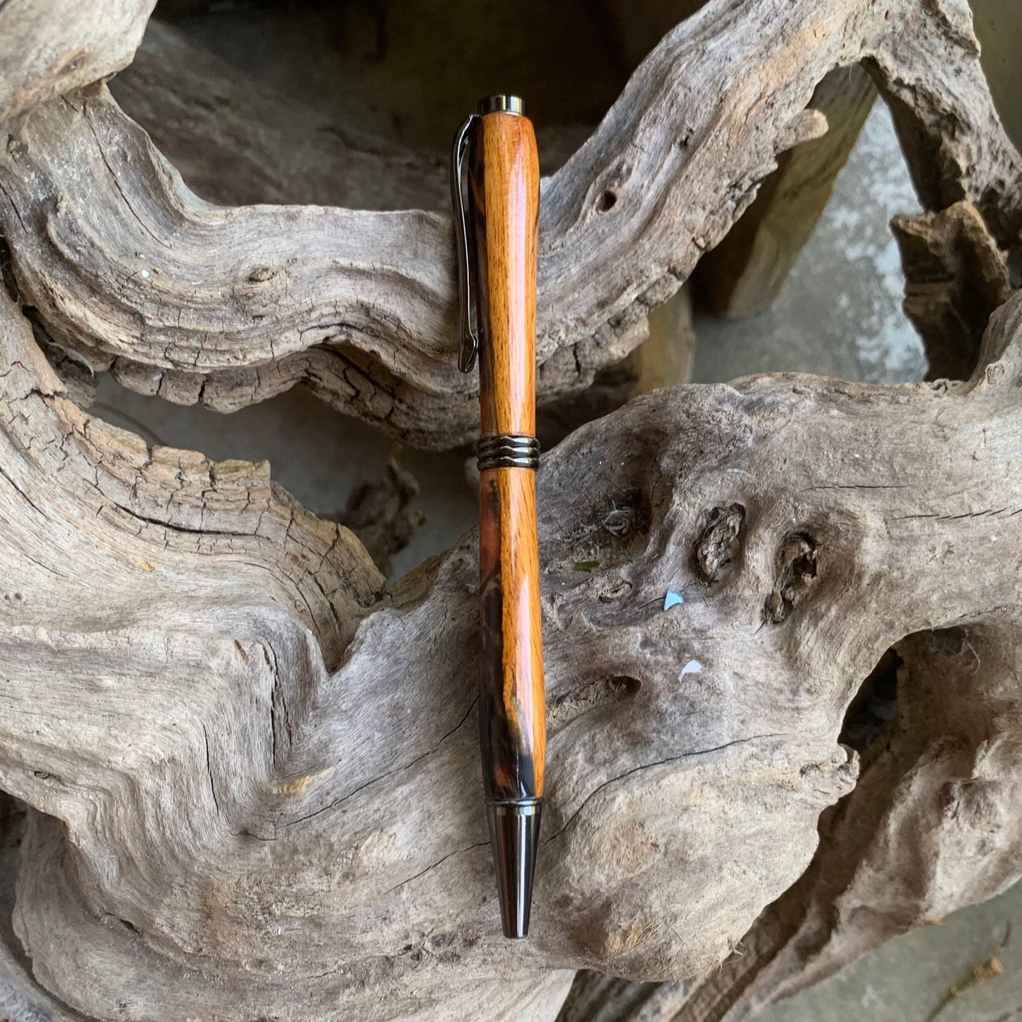 Driftwood and black and red resin pen