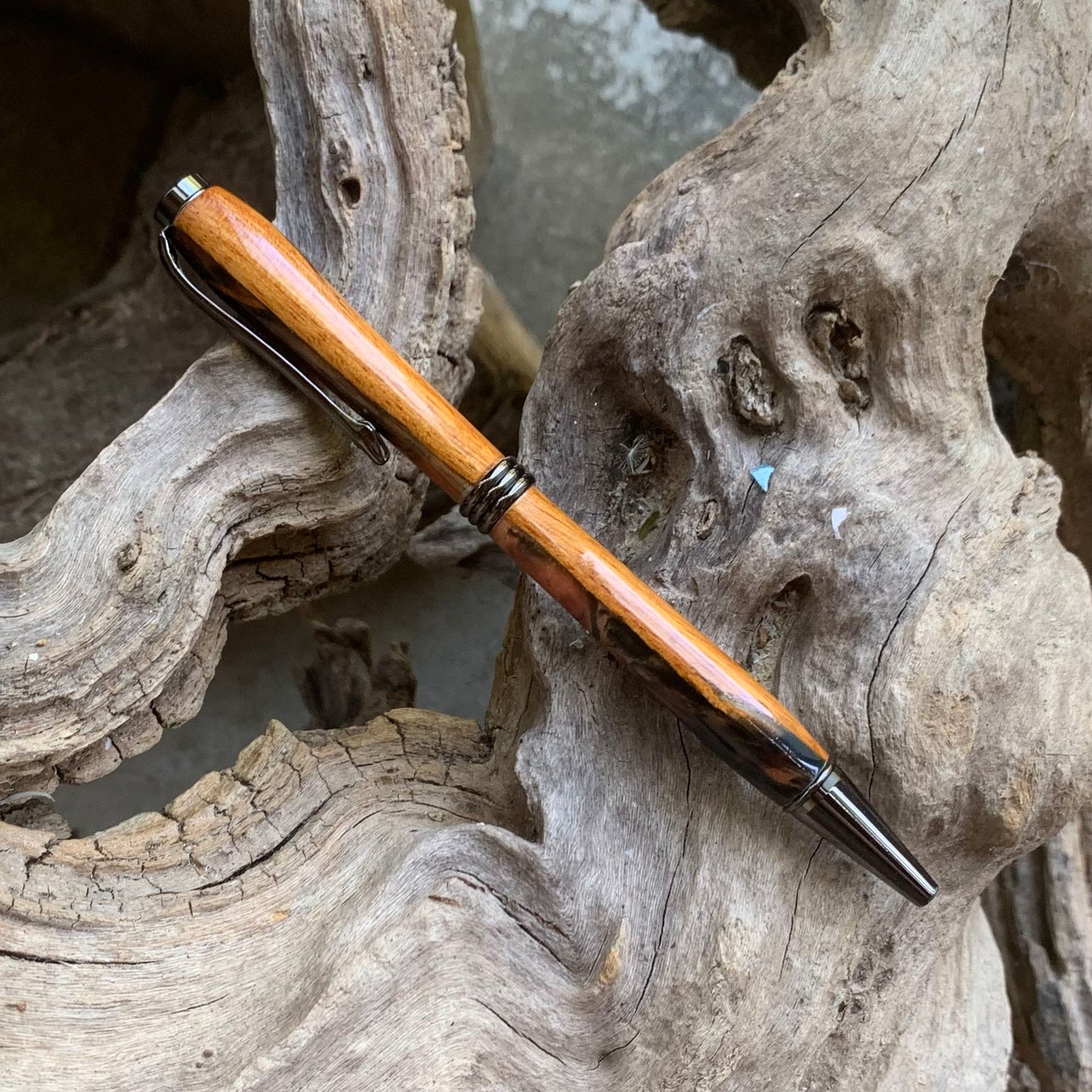 Driftwood and black and red resin pen