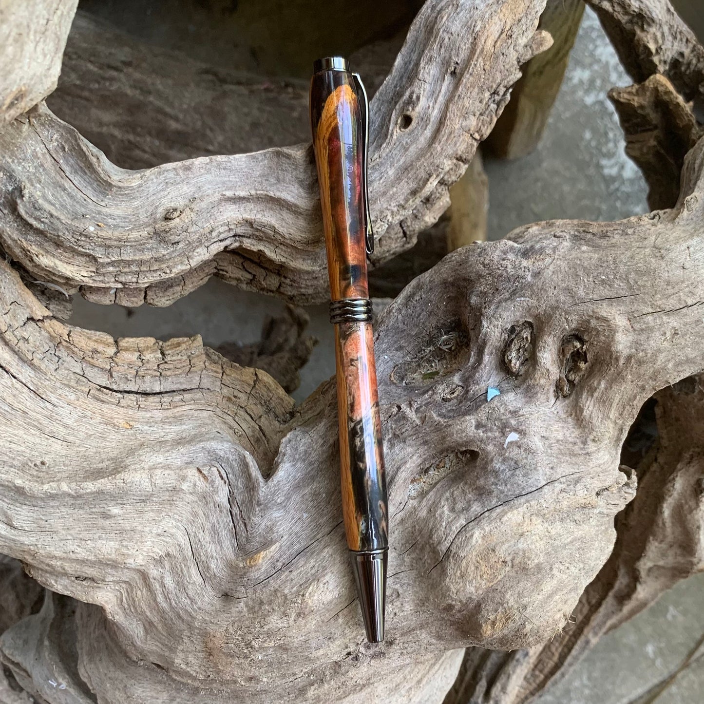 Driftwood and black and red resin pen