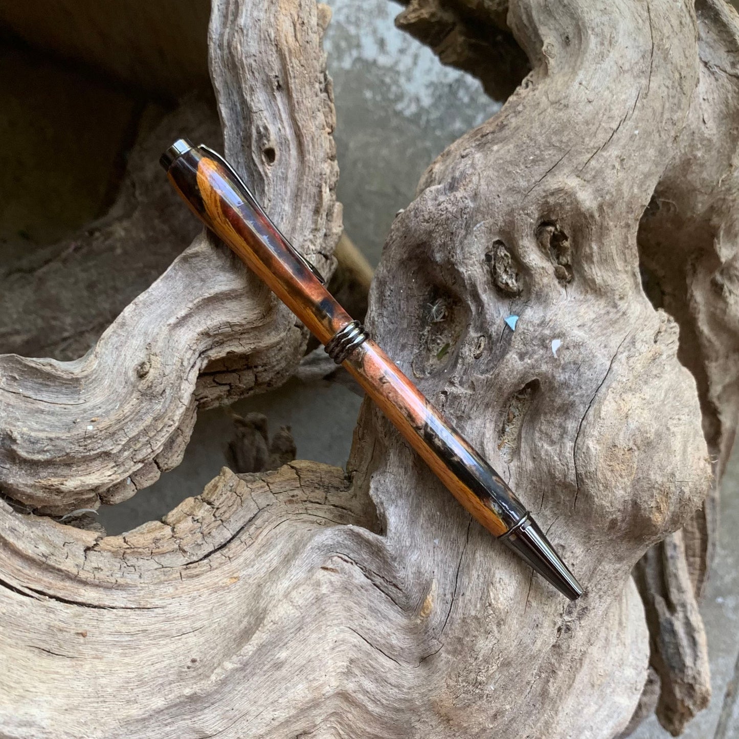 Driftwood and black and red resin pen