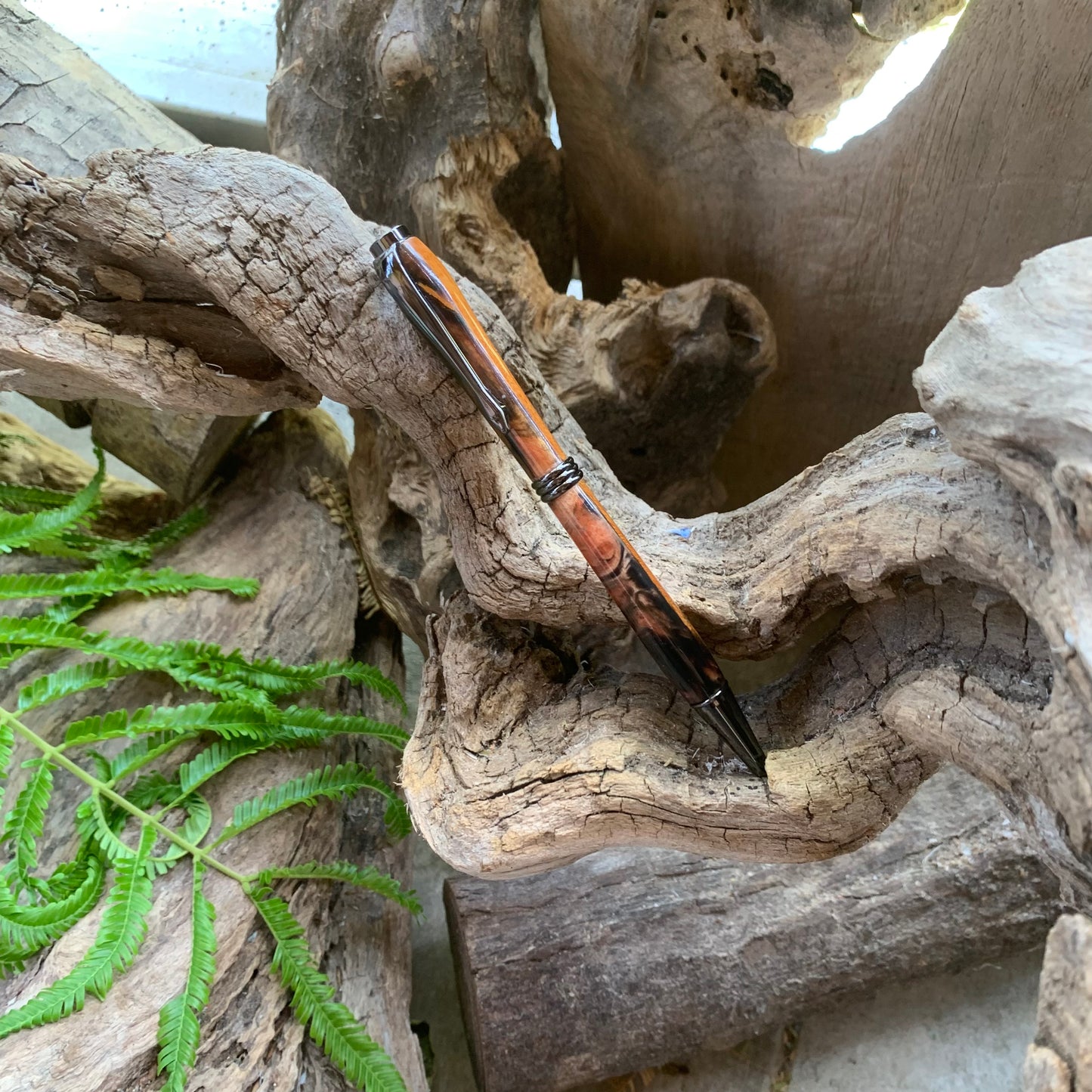 Driftwood and black and red resin pen