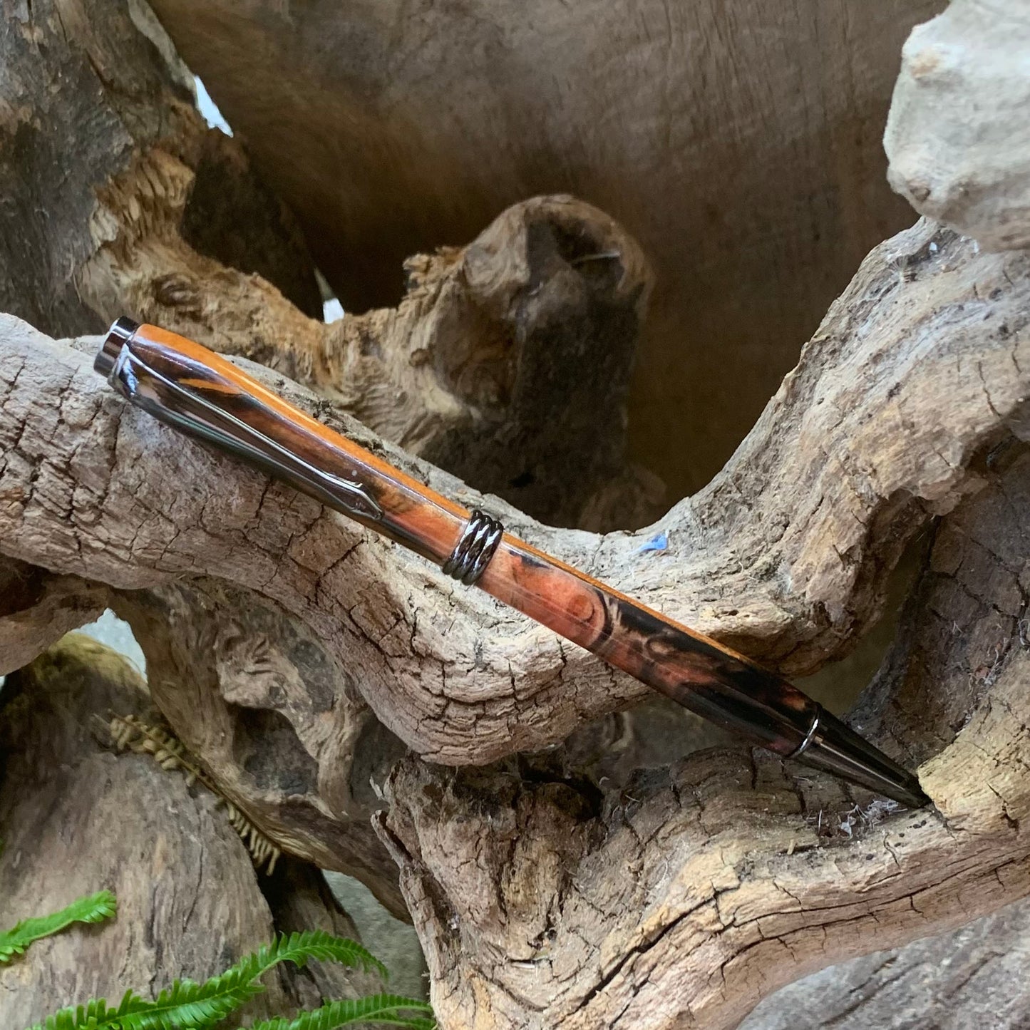 Driftwood and black and red resin pen