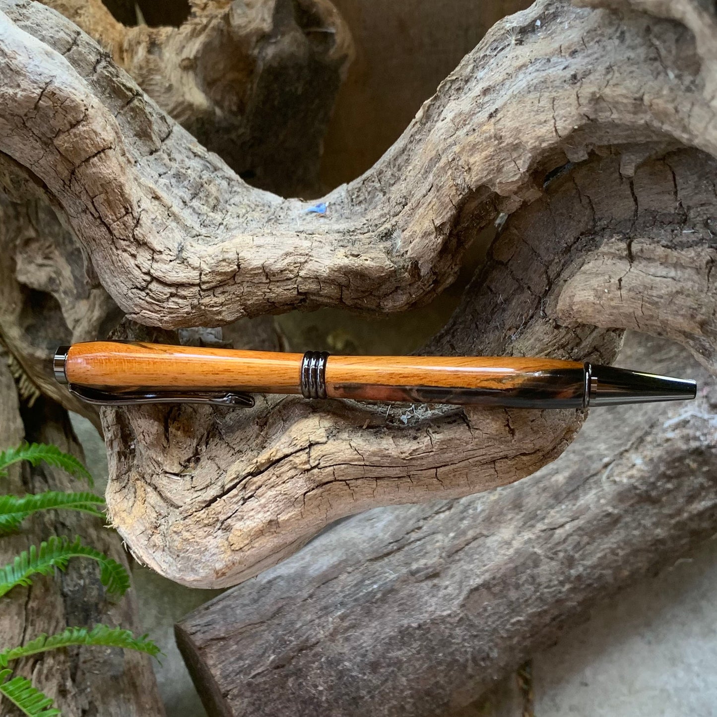 Driftwood and black and red resin pen