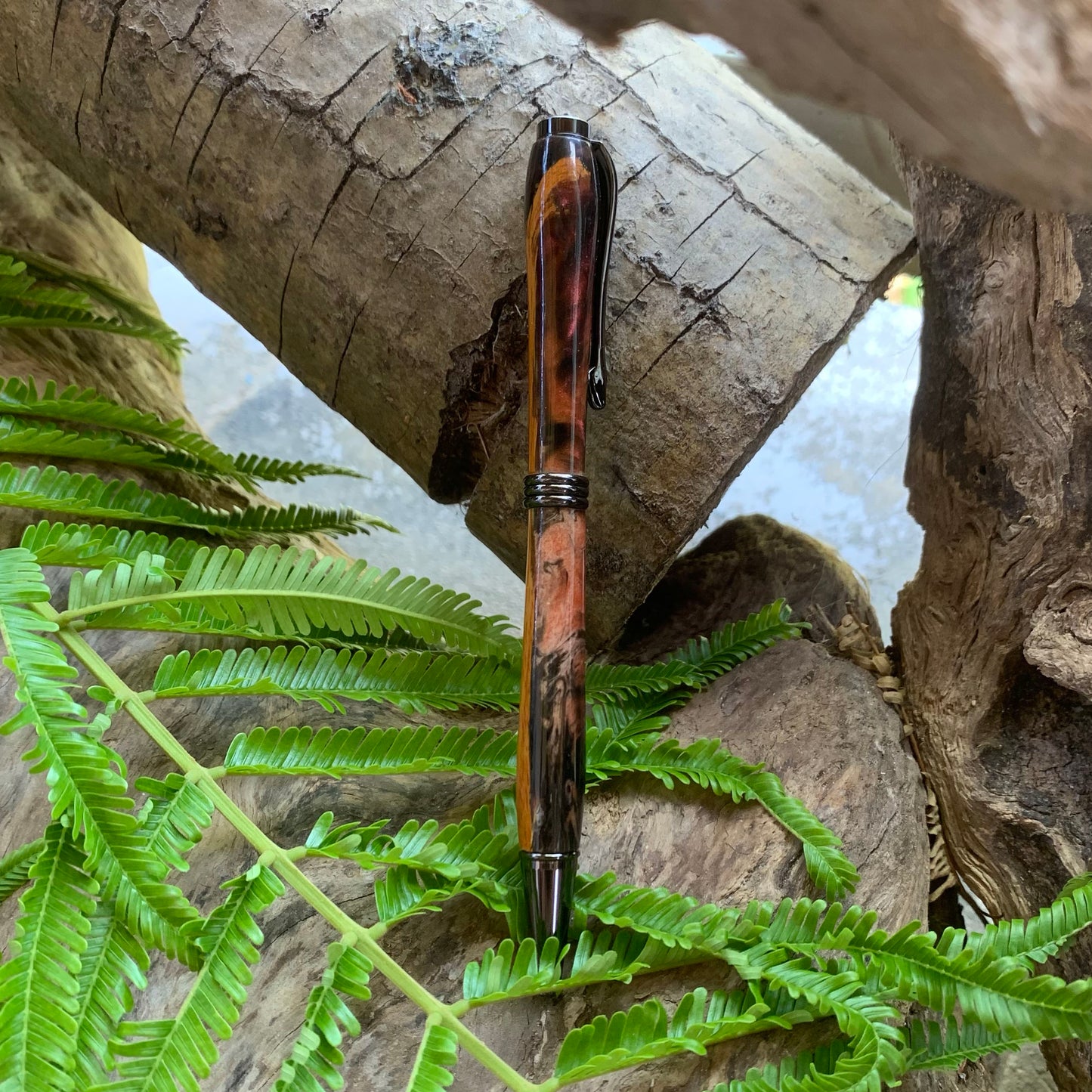 Driftwood and black and red resin pen