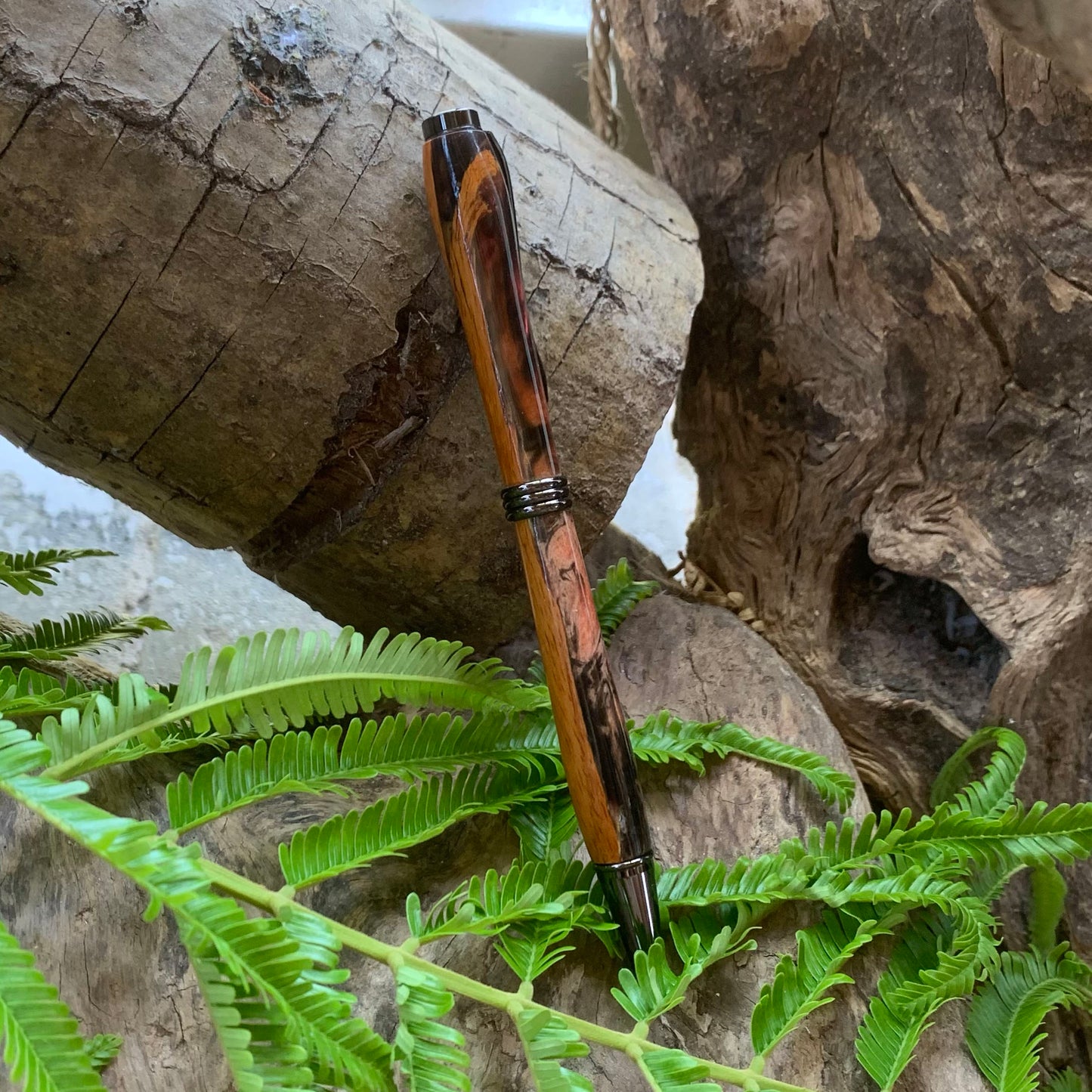 Driftwood and black and red resin pen