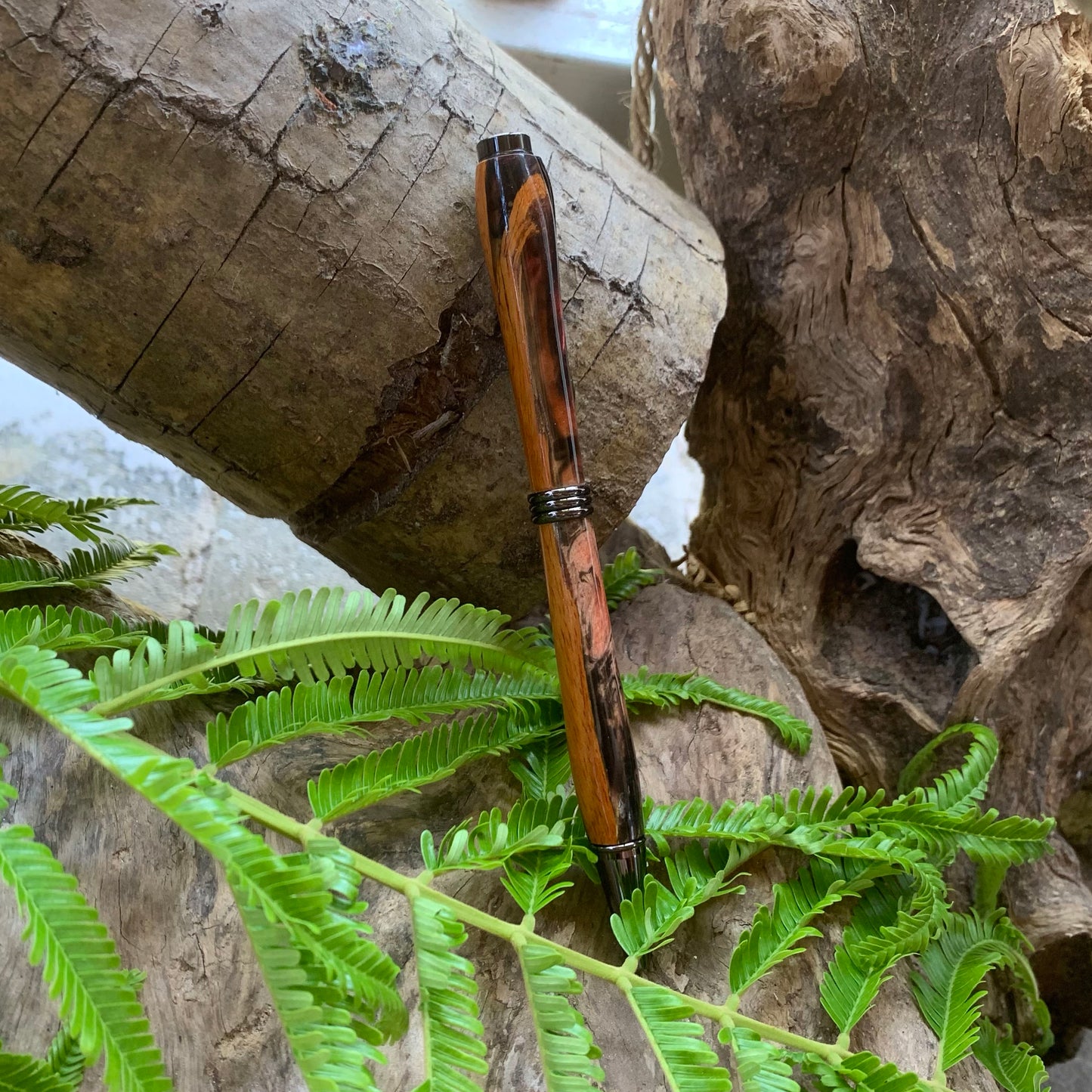 Driftwood and black and red resin pen