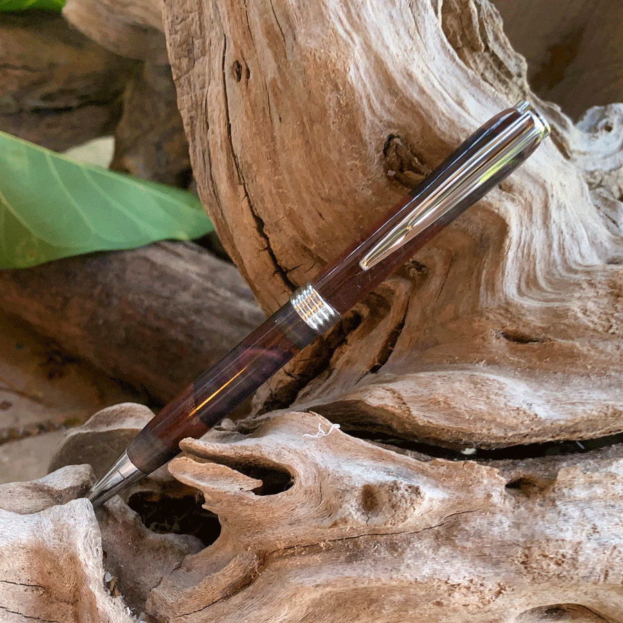 Driftwood and black and purple resin pen