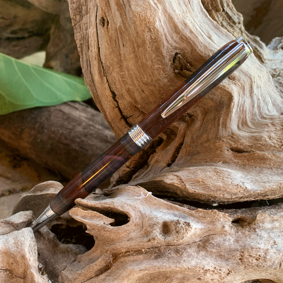 Driftwood and black and purple resin pen