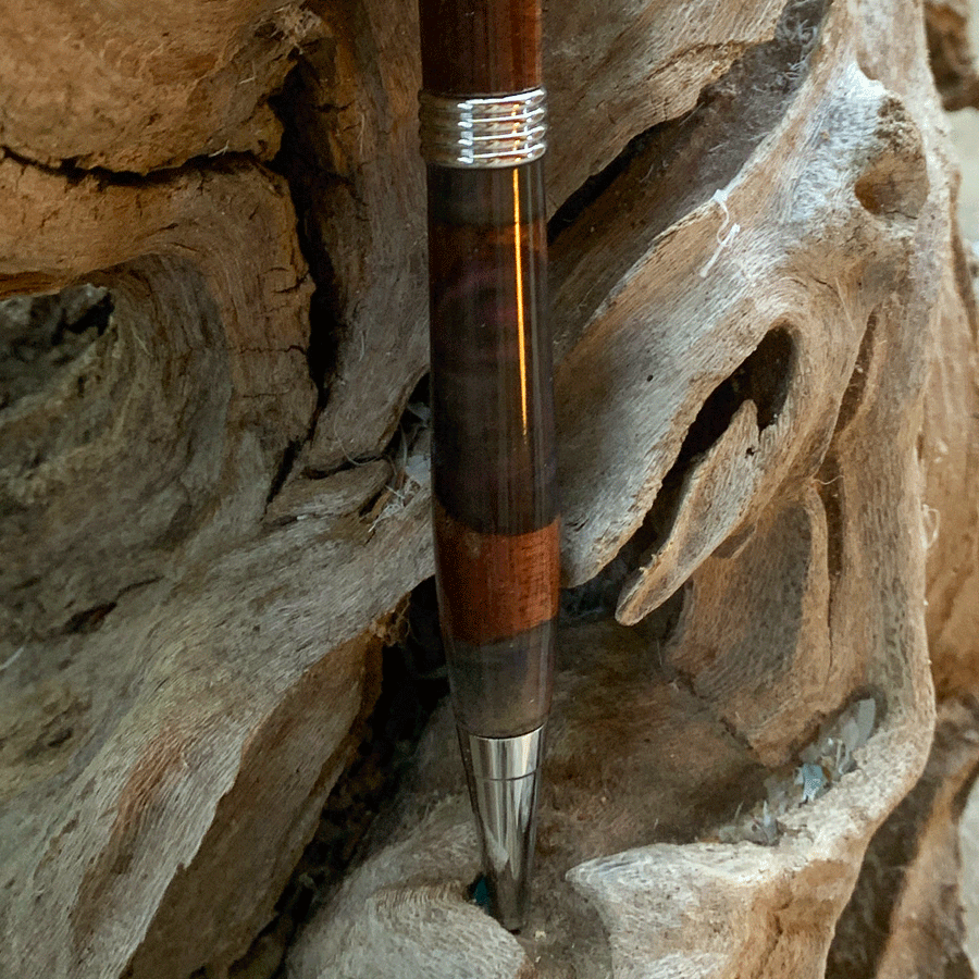 Driftwood and black and purple resin pen