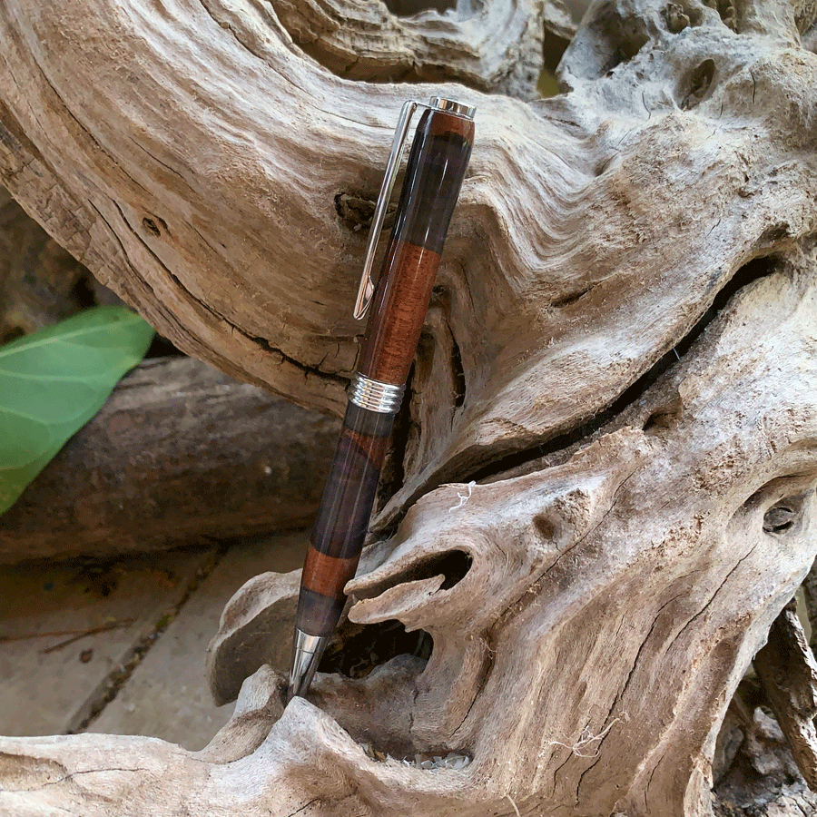 Driftwood and black and purple resin pen