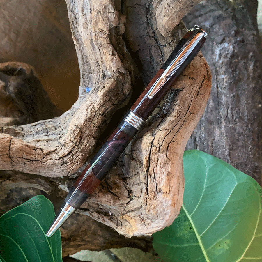 Driftwood and black and purple resin pen