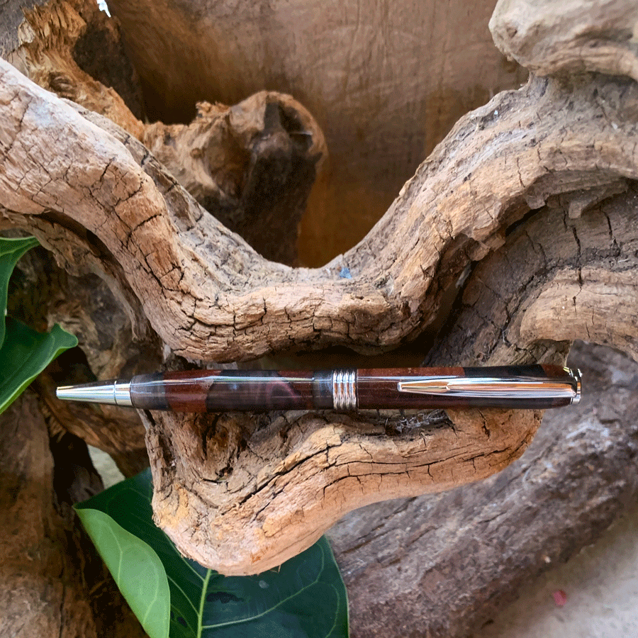 Driftwood and black and purple resin pen