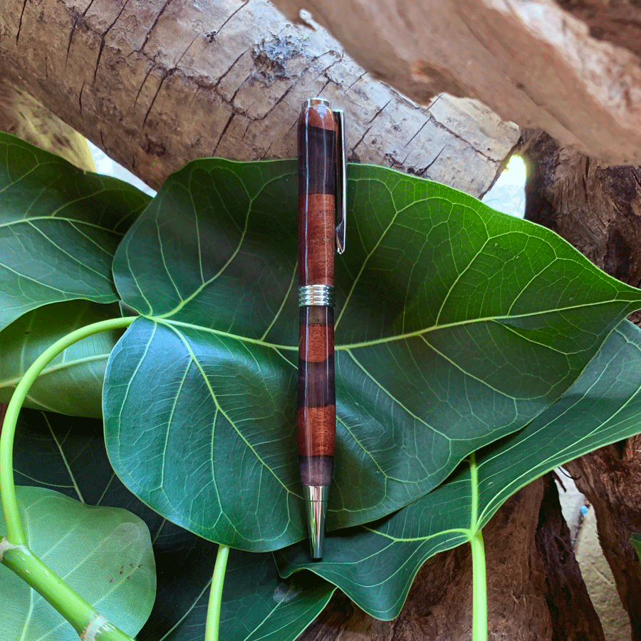 Driftwood and black and purple resin pen