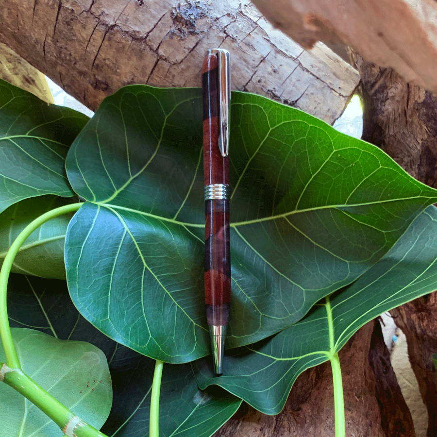 Driftwood and black and purple resin pen