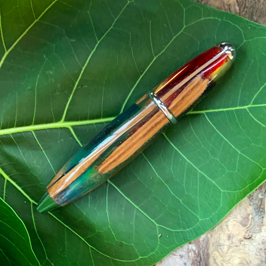 Driftwood and rainbow coloured resin pen