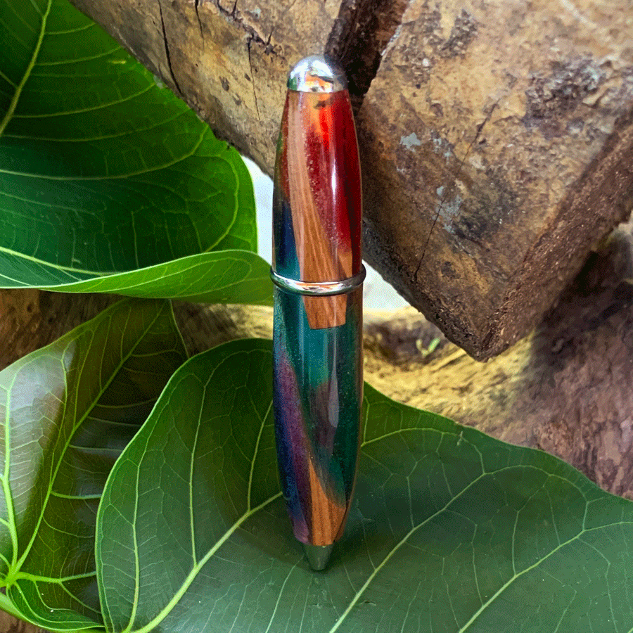 Driftwood and rainbow coloured resin pen