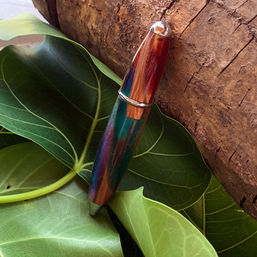 Driftwood and rainbow coloured resin pen