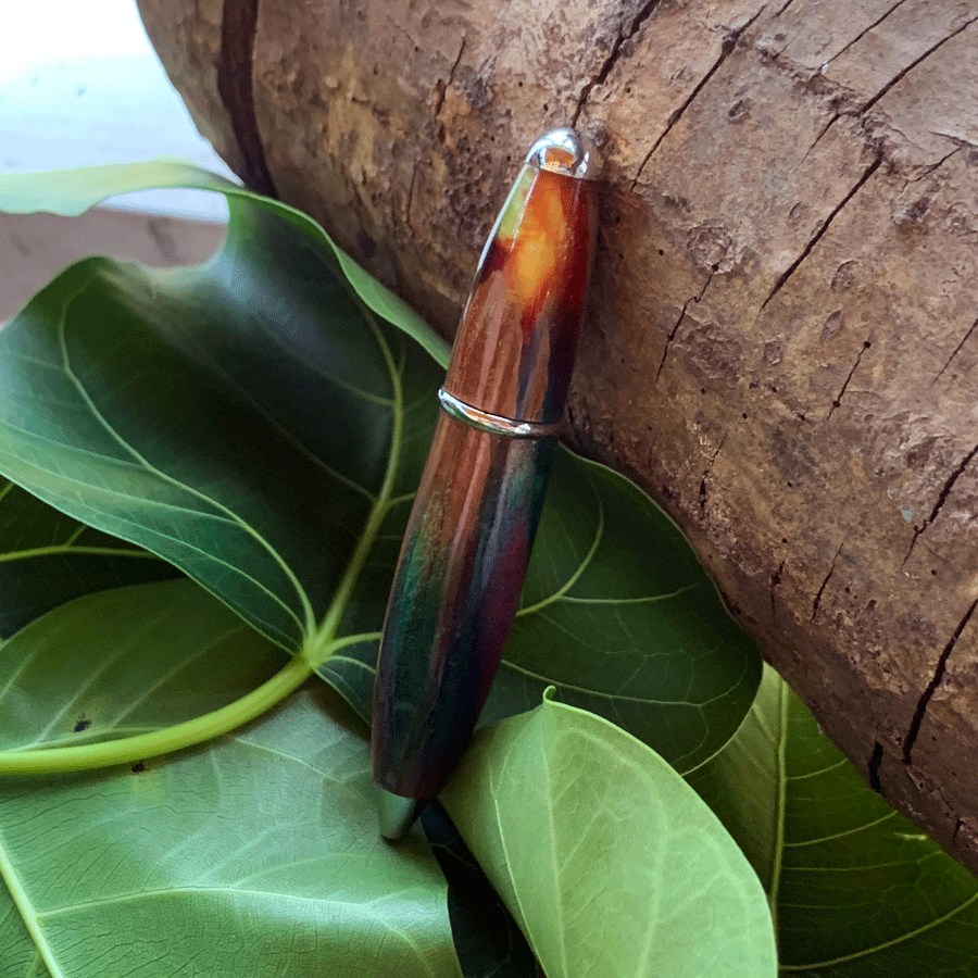 Driftwood and rainbow coloured resin pen