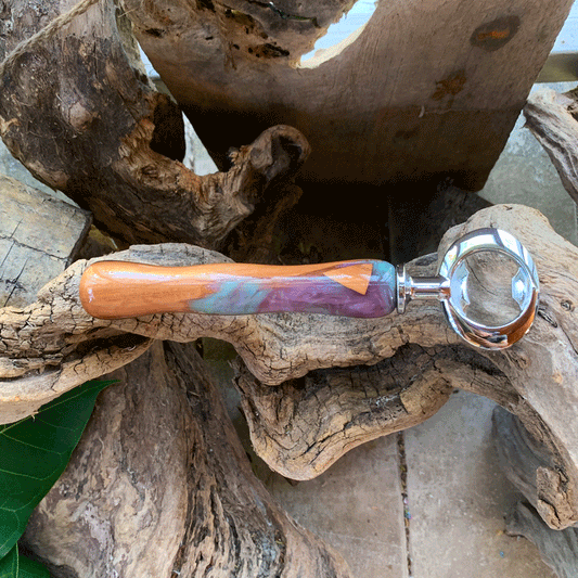 Driftwood and turquoise and purple resin bottle opener