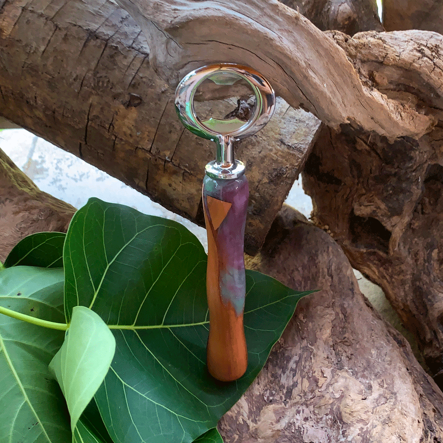 Driftwood and turquoise and purple resin bottle opener