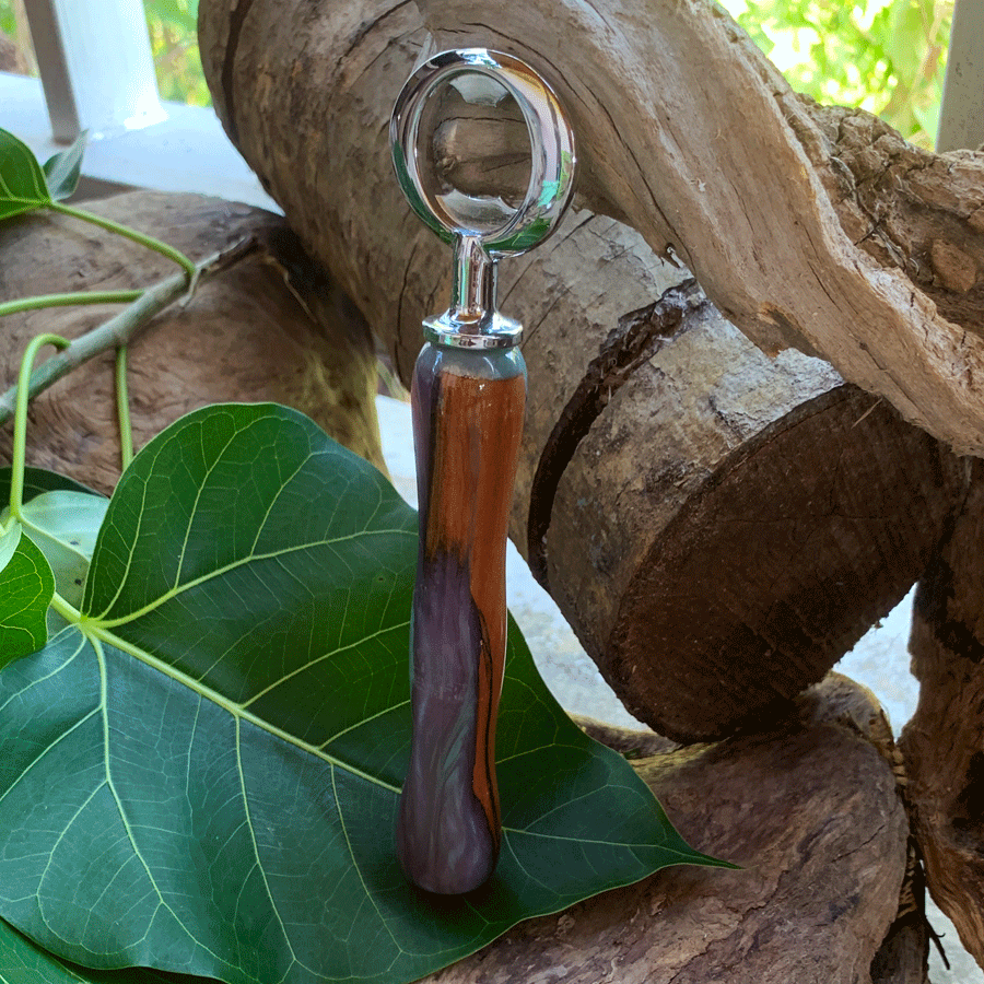 Driftwood and turquoise and purple resin bottle opener