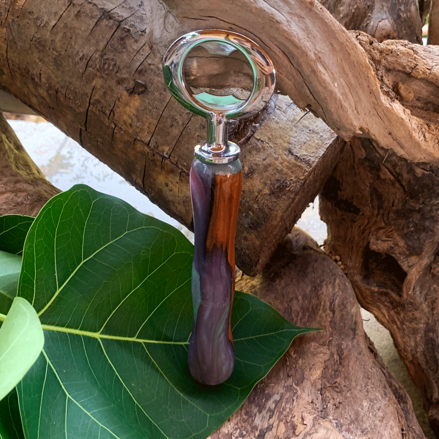 Driftwood and turquoise and purple resin bottle opener