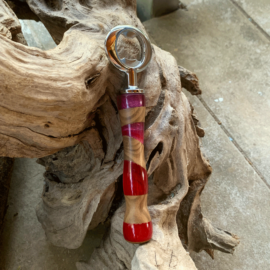 Driftwood and pink and red resin bottle opener