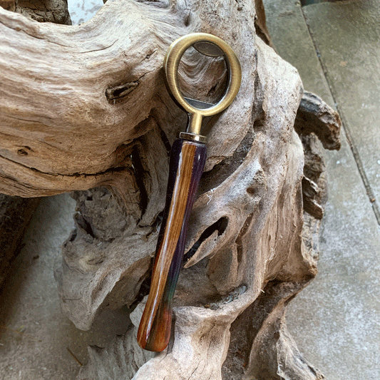 Driftwood and rainbow coloured resin bottle opener