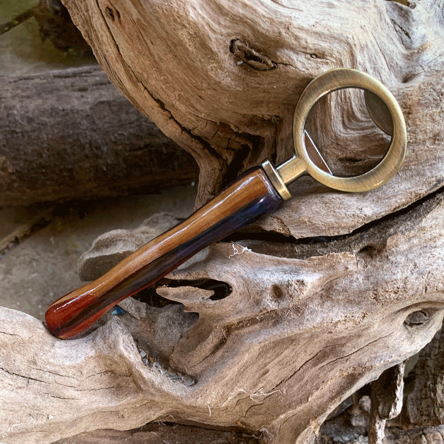 Driftwood and rainbow coloured resin bottle opener