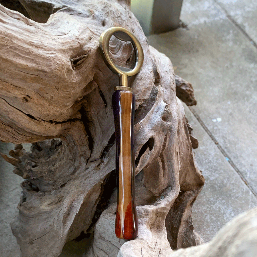 Driftwood and rainbow coloured resin bottle opener