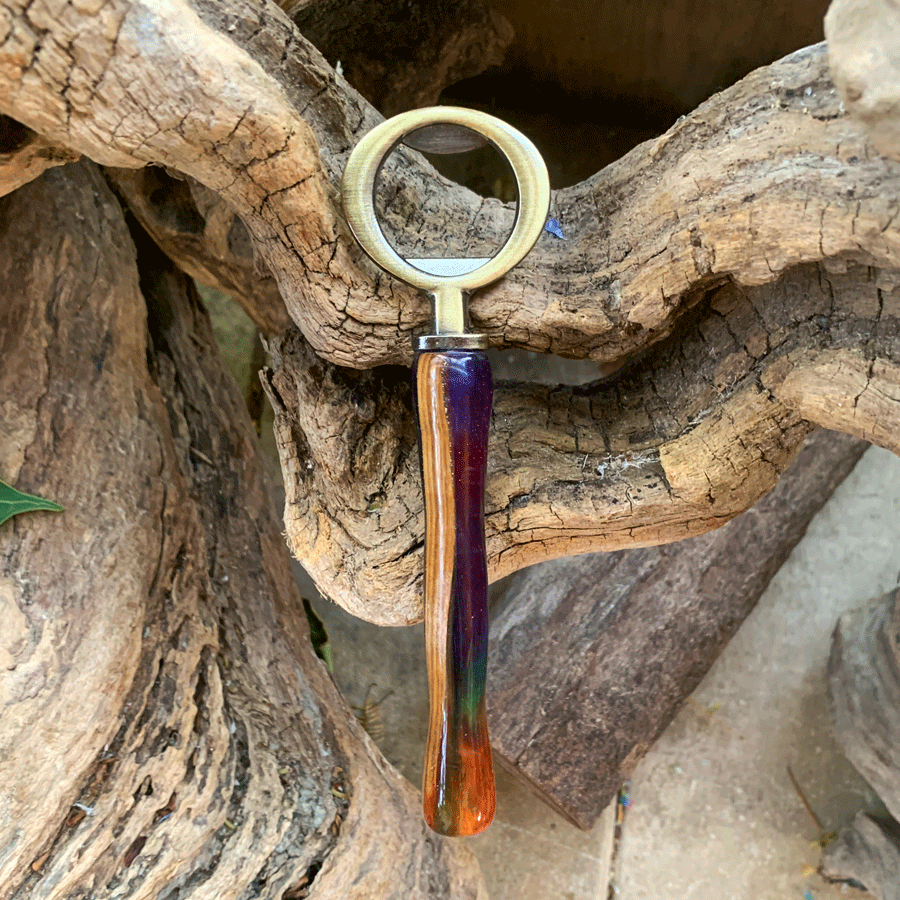 Driftwood and rainbow coloured resin bottle opener