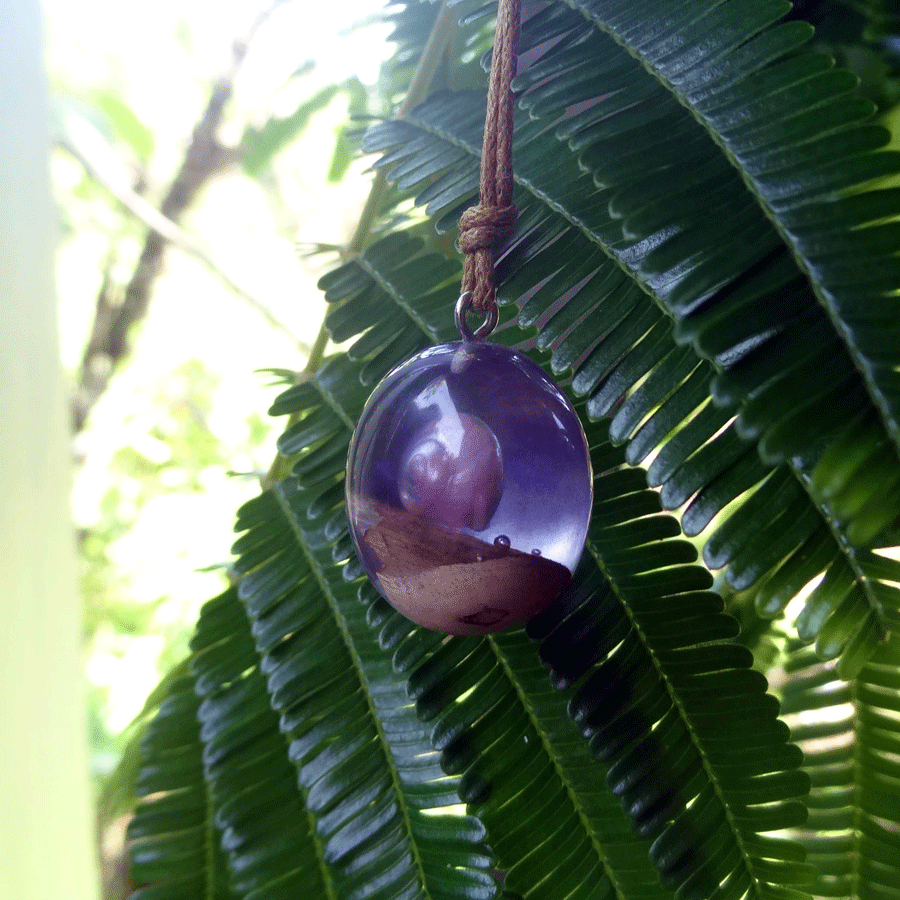 Driftwood with light purple resin and shell